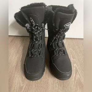 Women’s Snowboots w/ waterproof lace-up mid calf winter deep tread rubber sole.